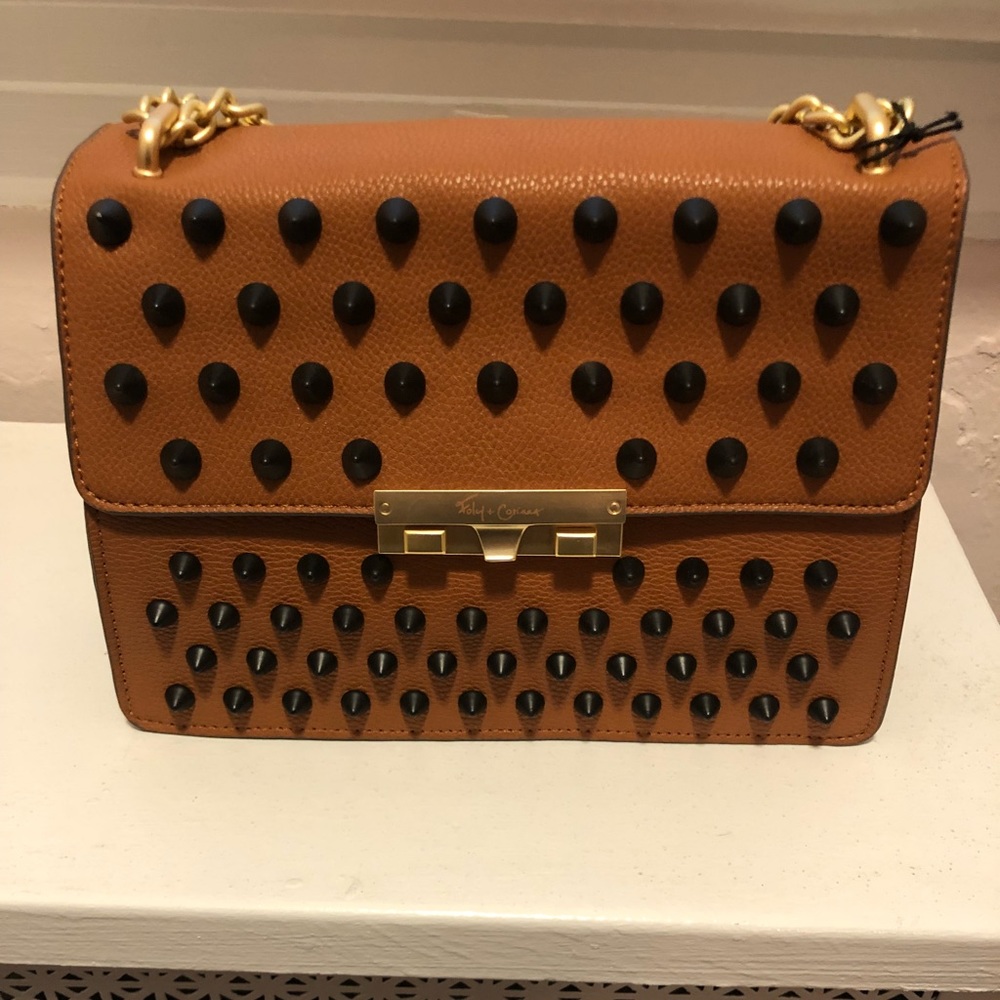 Foley and Corinna spiked bag